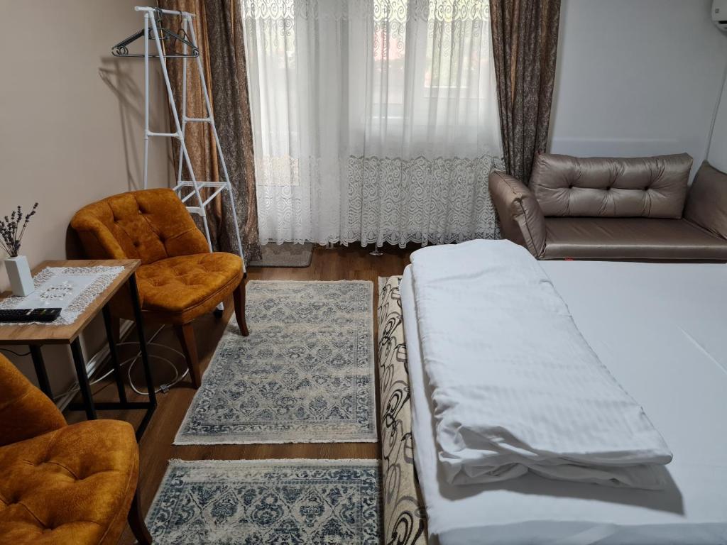 Postel nebo postele na pokoji v ubytování Pensiunea Clasic