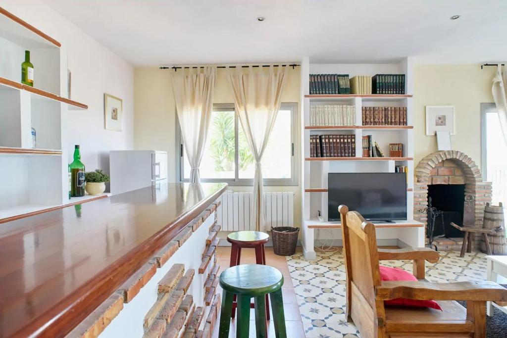 Posedenie v ubytovaní Spacious villa with sea view in Olivella + private pool