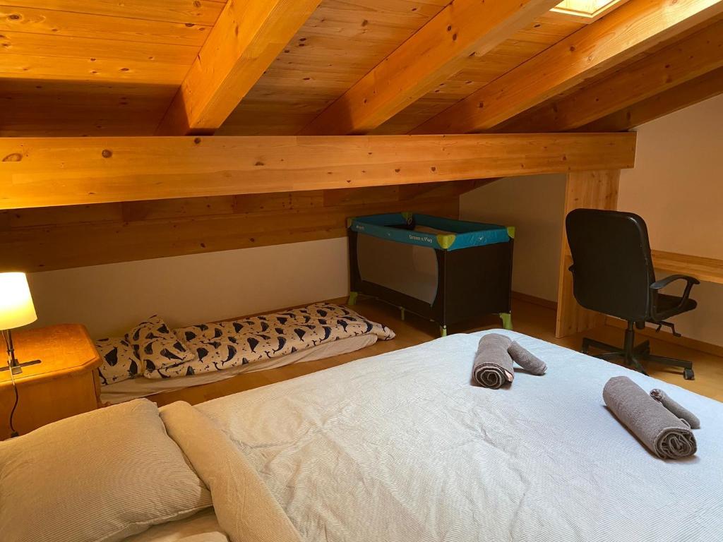 Letto o letti in una camera di Attic in the Alps