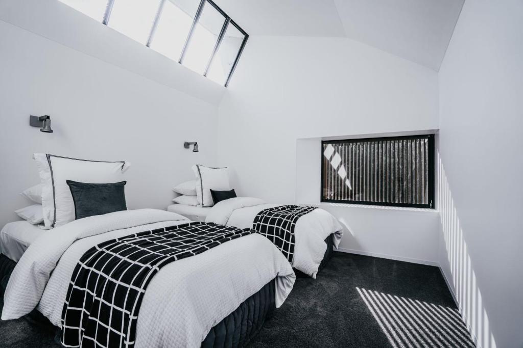 Postel nebo postele na pokoji v ubytování Alkina Lodge Mira