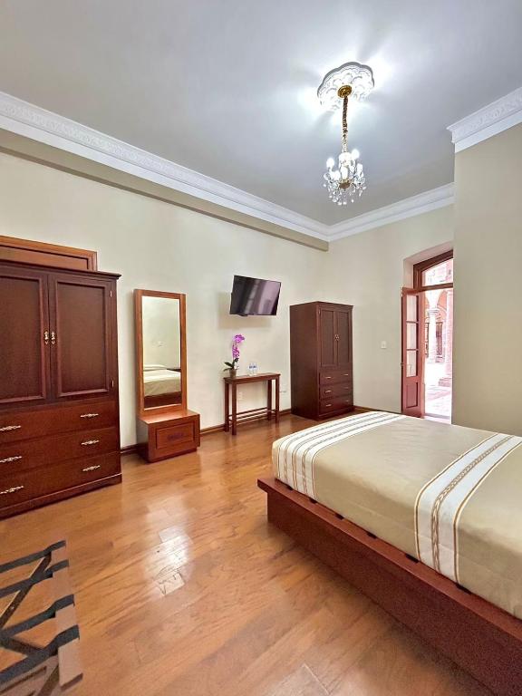Postel nebo postele na pokoji v ubytování Hotel Cantera Real, Morelia