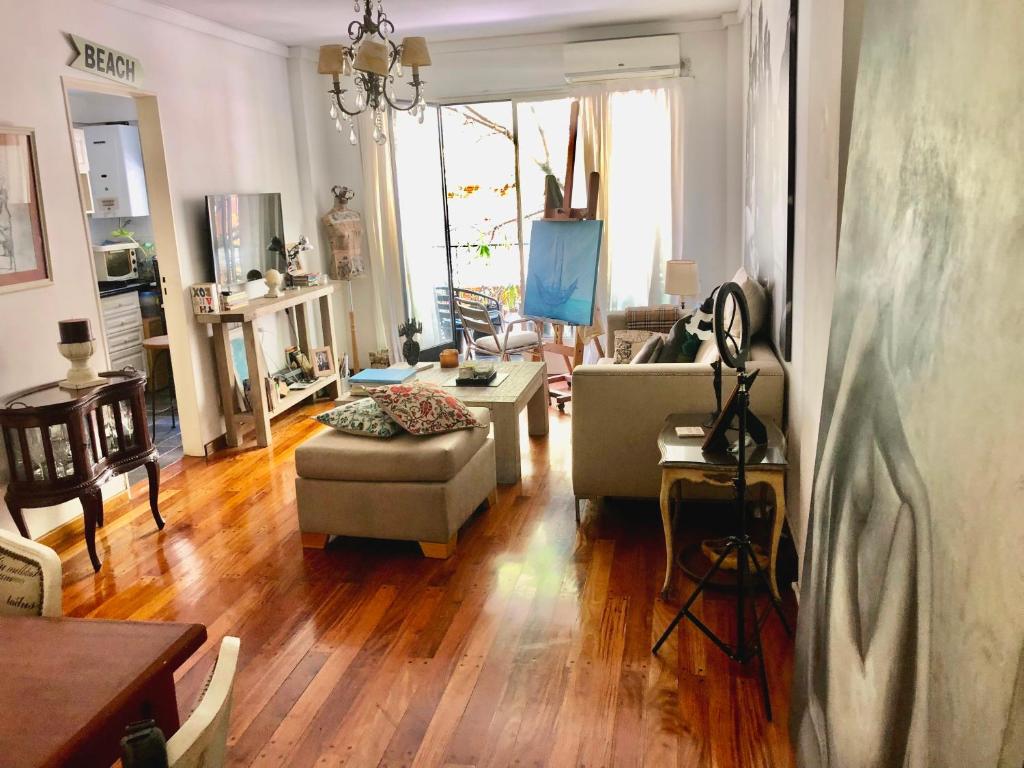 Χώρος καθιστικού στο Te invito a Compartir mi Depto. Artlovers. Solo Damas.