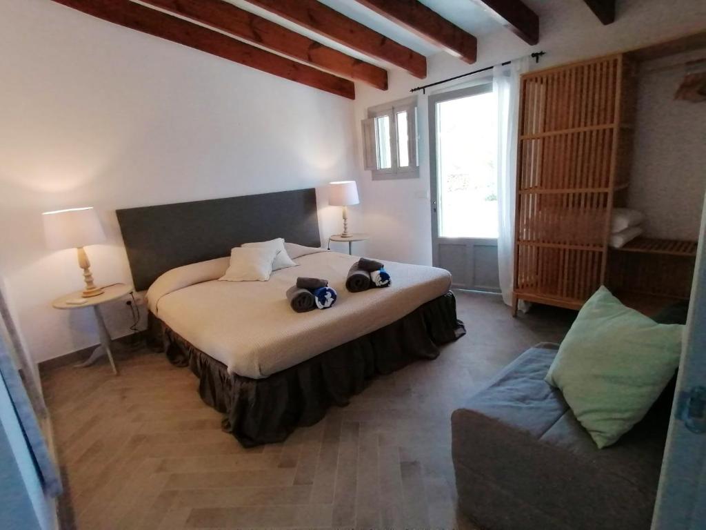 A bed or beds in a room at Comfortable House in Formentera with Garden and Terrace