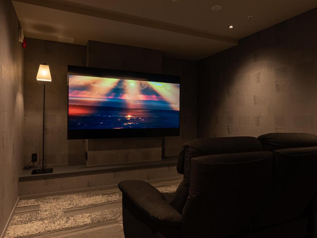 TV a/nebo společenská místnost v ubytování Hotel Koyo