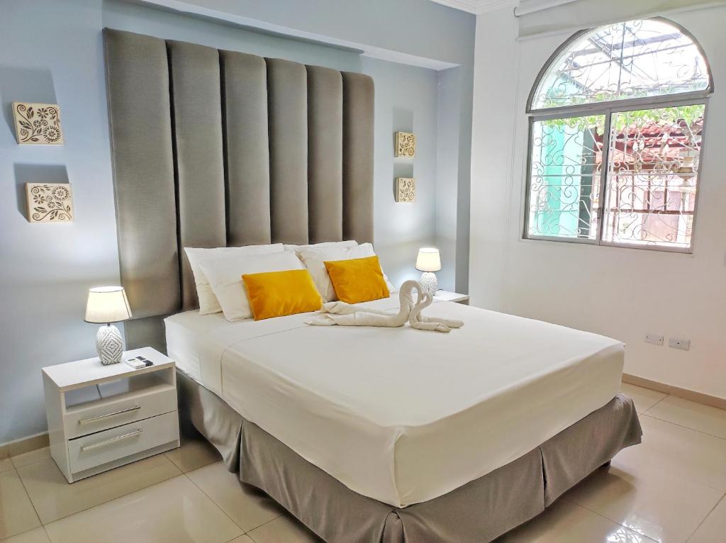 Postel nebo postele na pokoji v ubytování Hotel Boutique Casa Umiña