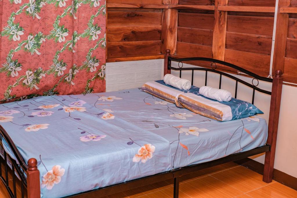 Postel nebo postele na pokoji v ubytování Ana's Bungalow