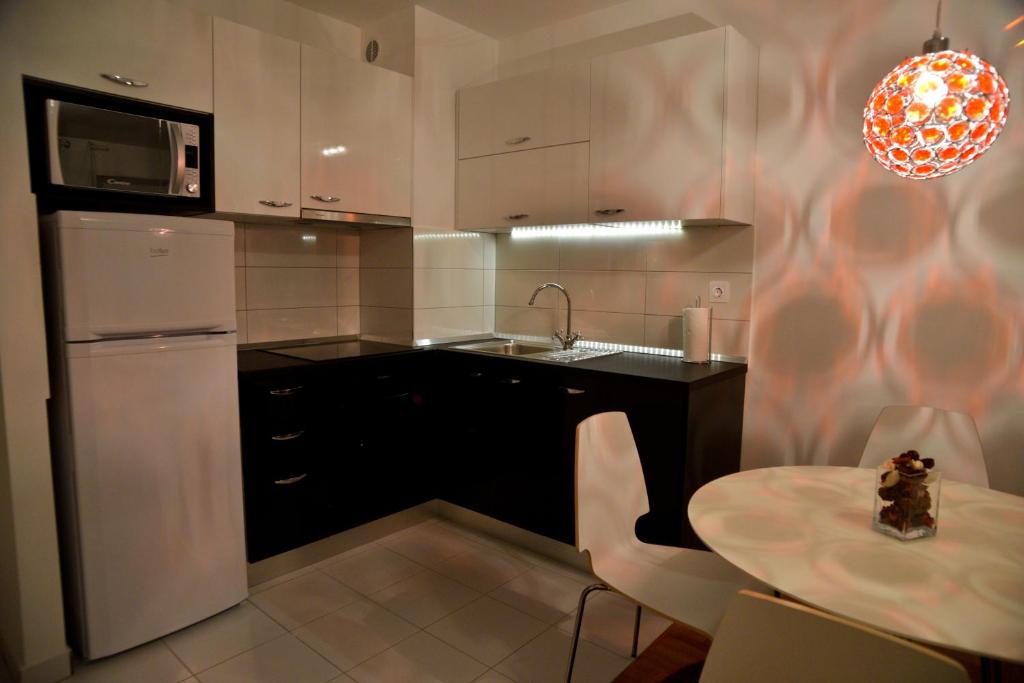 Kuchyňa alebo kuchynka v ubytovaní Golden Gate Apartment Zadar