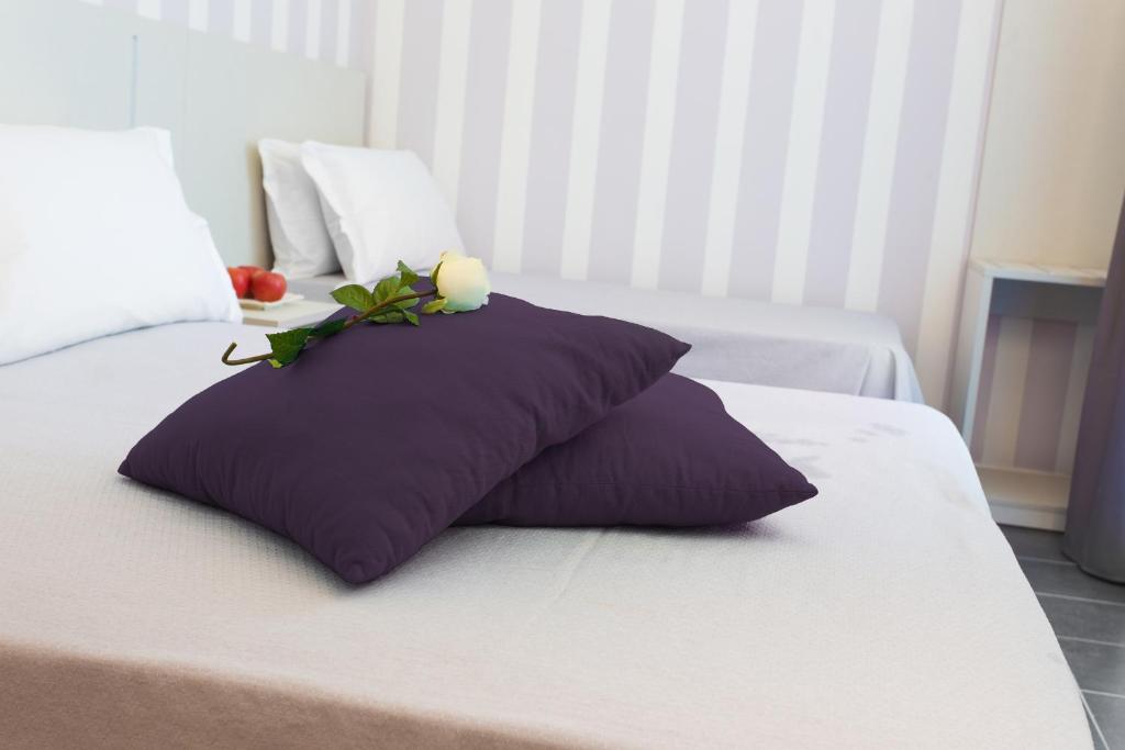 Postel nebo postele na pokoji v ubytování Hotel Star