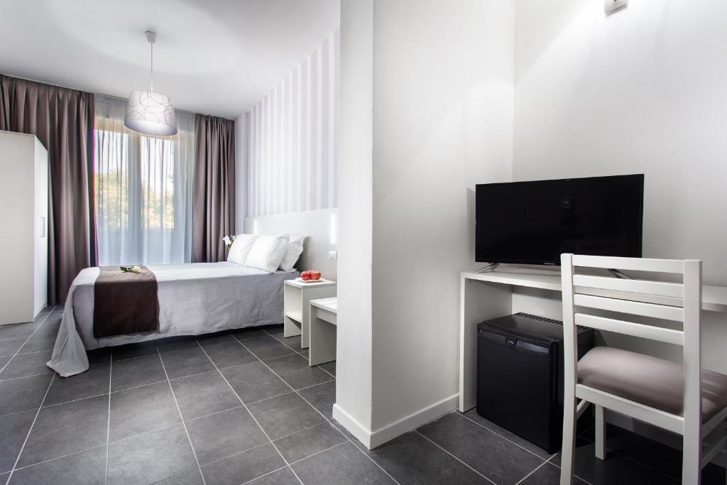 Postel nebo postele na pokoji v ubytování Hotel Star