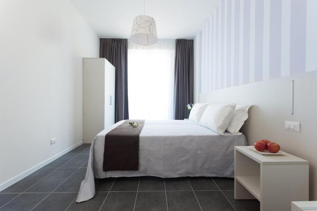 Postel nebo postele na pokoji v ubytování Hotel Star