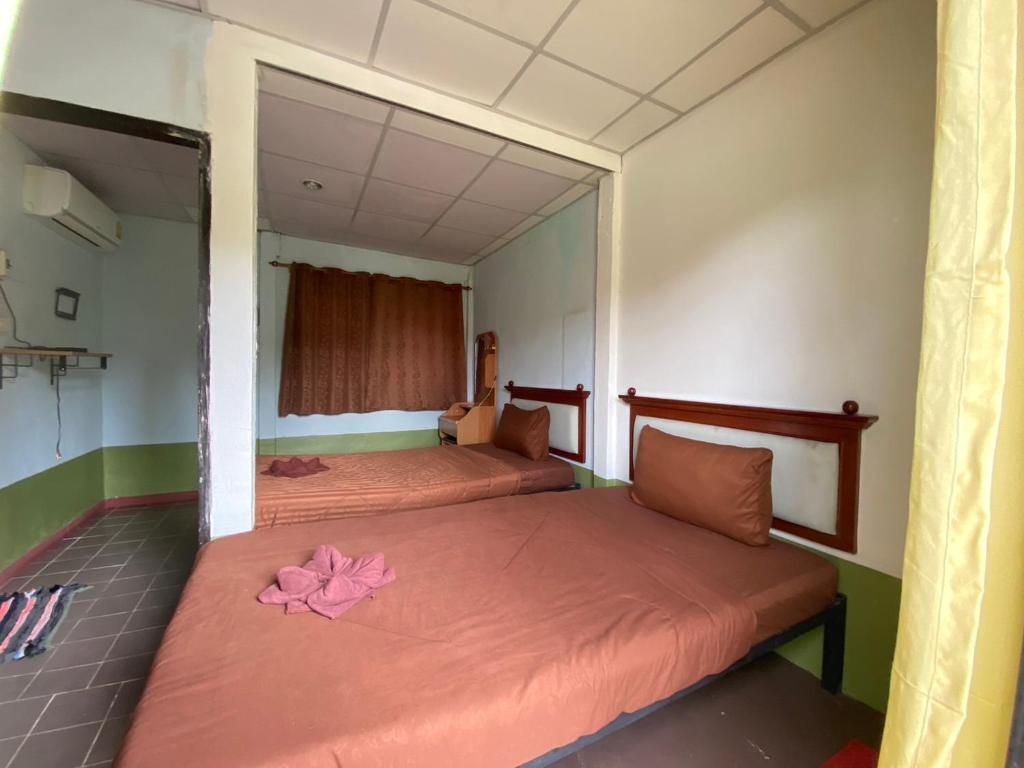 Postel nebo postele na pokoji v ubytování Bansuan Inthanon Eco Resort