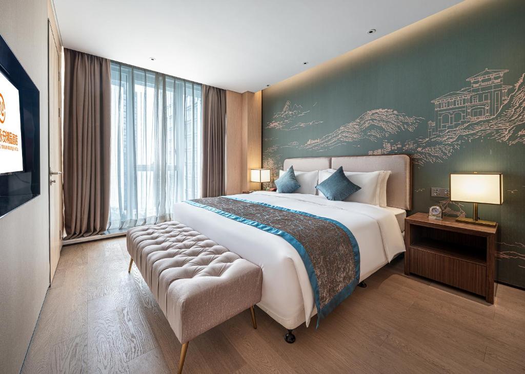 Letto o letti in una camera di Qin Huang Yong An Boutique Hotel