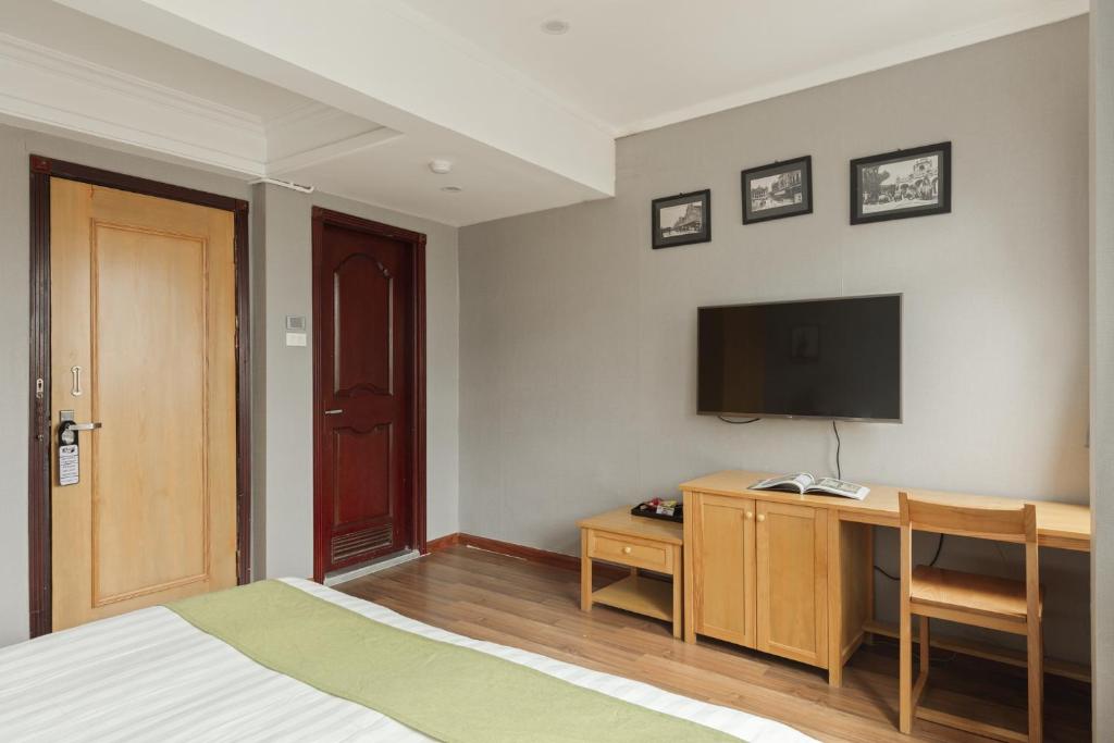 TV a/nebo společenská místnost v ubytování Hanoi Central Park Hotel