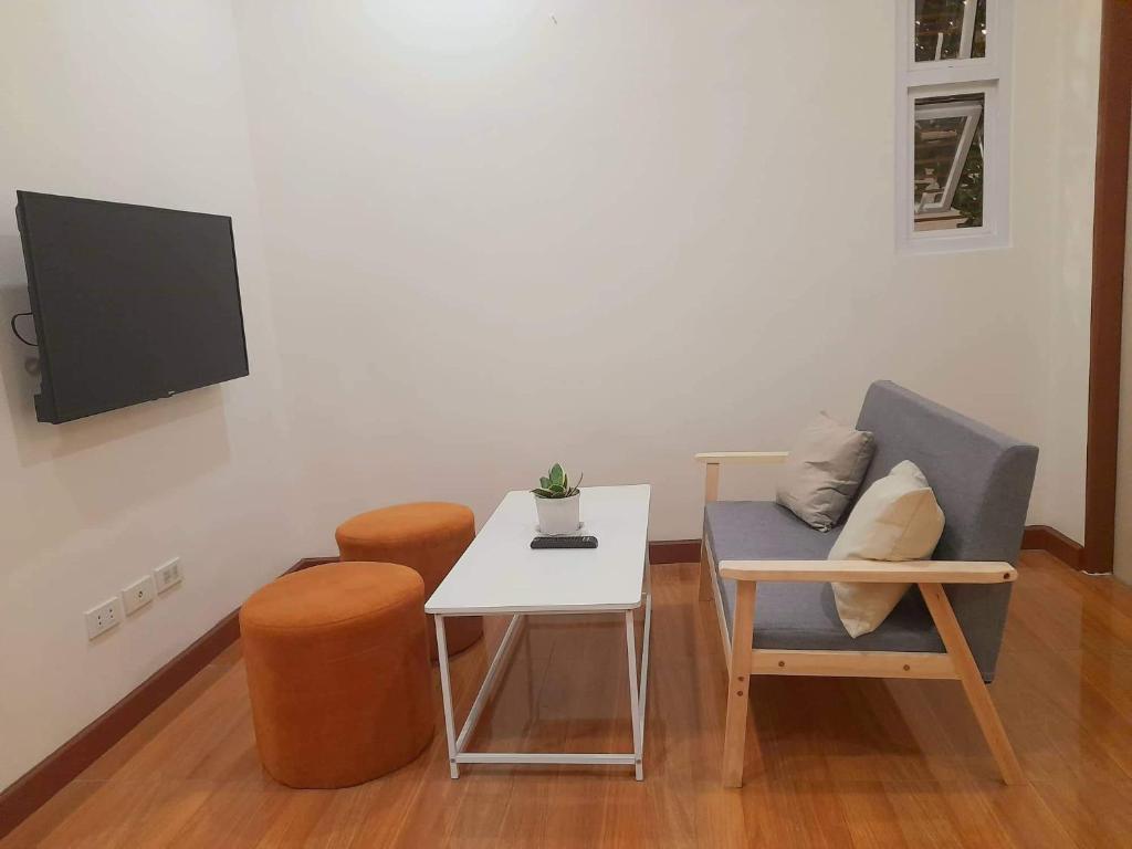 TV a/nebo společenská místnost v ubytování Eekos Bed and Breakfast