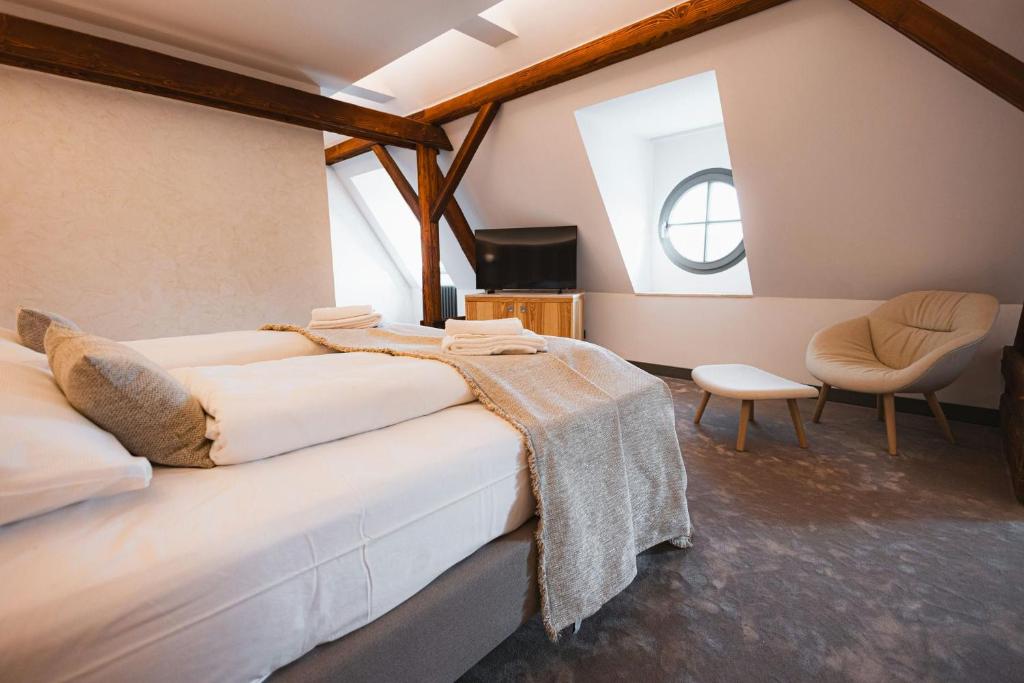 Postel nebo postele na pokoji v ubytování Hotel ALBRECHT