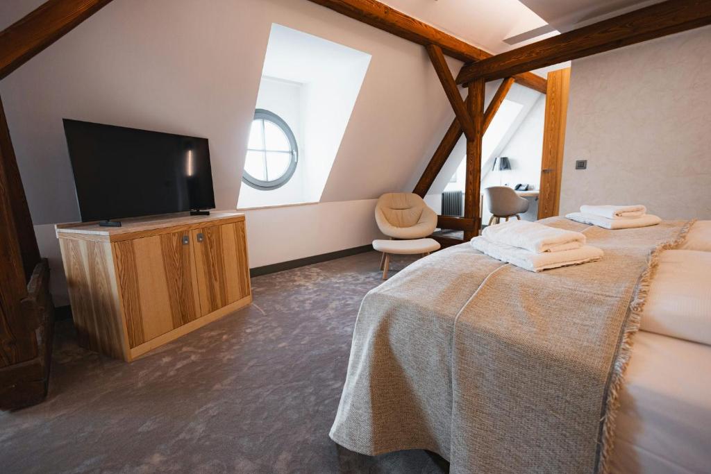 Postel nebo postele na pokoji v ubytování Hotel ALBRECHT
