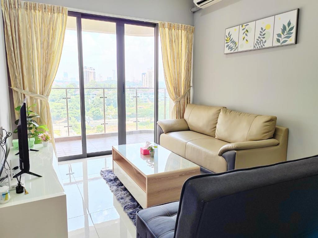 a living room with a couch and a table at JOHOR BAHRU DANGABAY CIQ CITYSQUARE 2Bd 6PAX in Johor Bahru