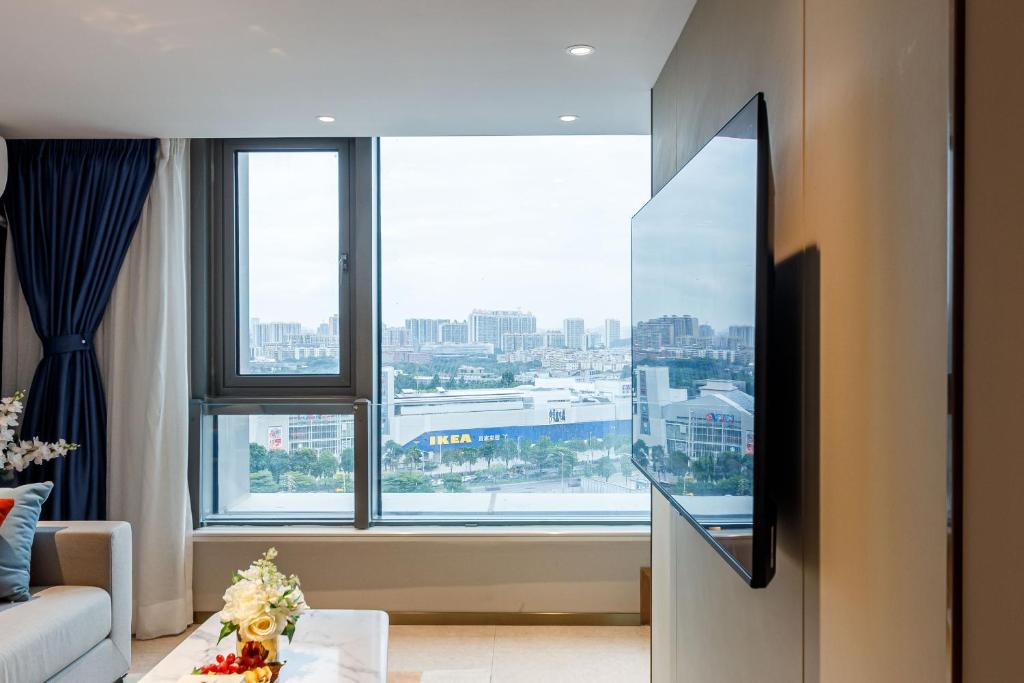 TV a/nebo společenská místnost v ubytování Livetour Hotel Sanxi Metro Guangzhou