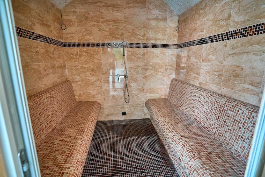 Koupelna v ubytování Villa Simida