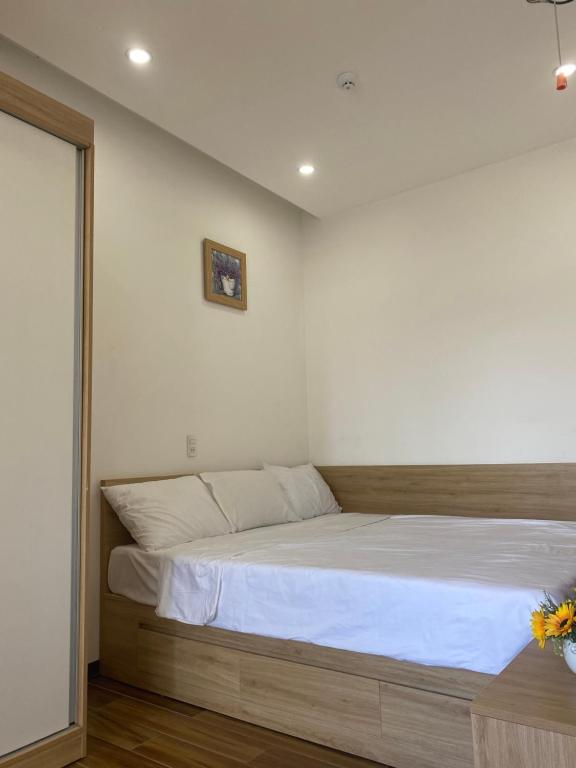 Postel nebo postele na pokoji v ubytování Tree Homestay