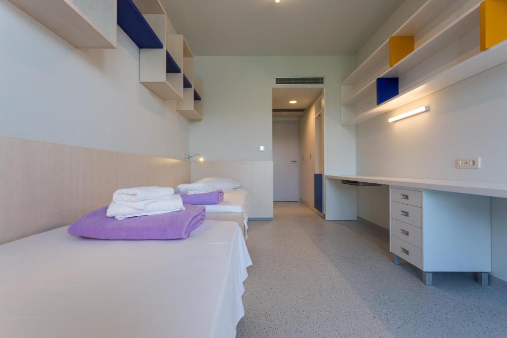 Postel nebo postele na pokoji v ubytování B&B rooms BB