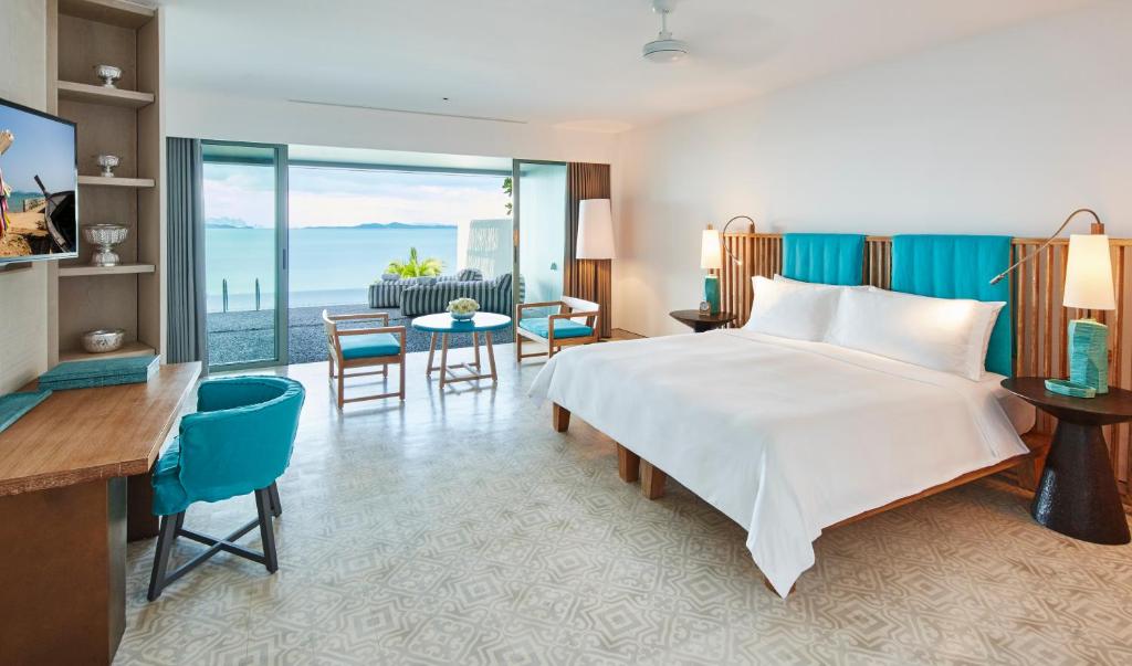 Postel nebo postele na pokoji v ubytování COMO Point Yamu, Phuket