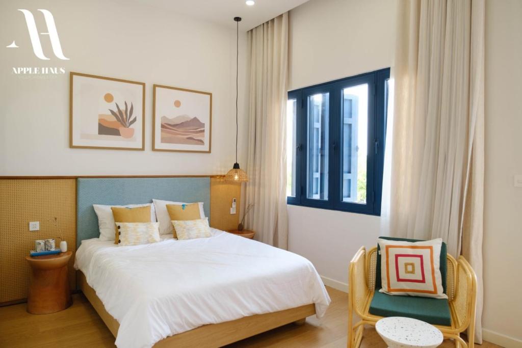 Giường trong phòng chung tại Apple Hause Venuestay