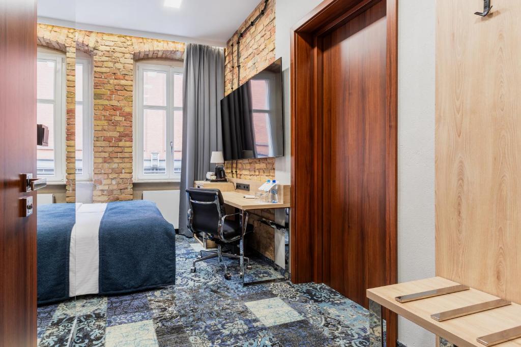 Postel nebo postele na pokoji v ubytování Apartamenty Browar Luxury Old Town Poznań 24h