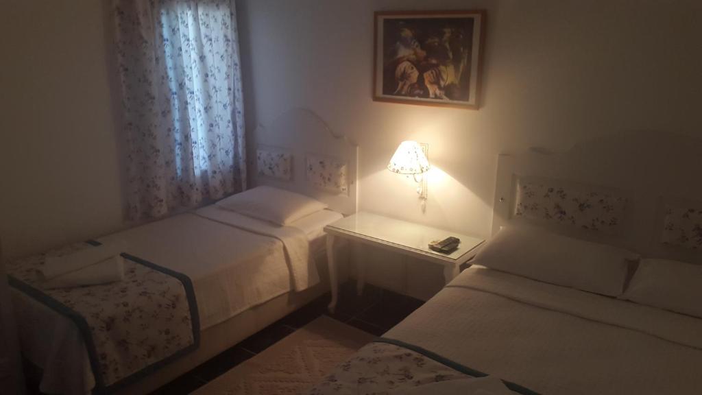 Postel nebo postele na pokoji v ubytování Pasha Motel