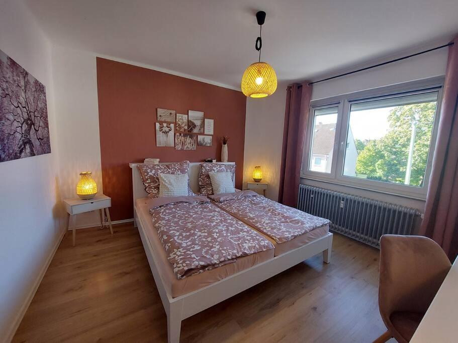Gemütliche Familienwohnung mit WLAN und Stellplatz tesisinde bir odada yatak veya yataklar