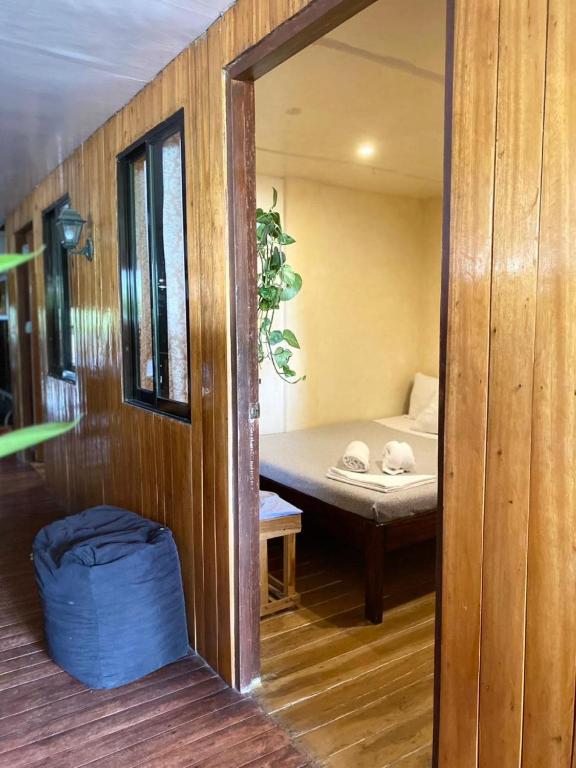 Postel nebo postele na pokoji v ubytování Malayah Hostel