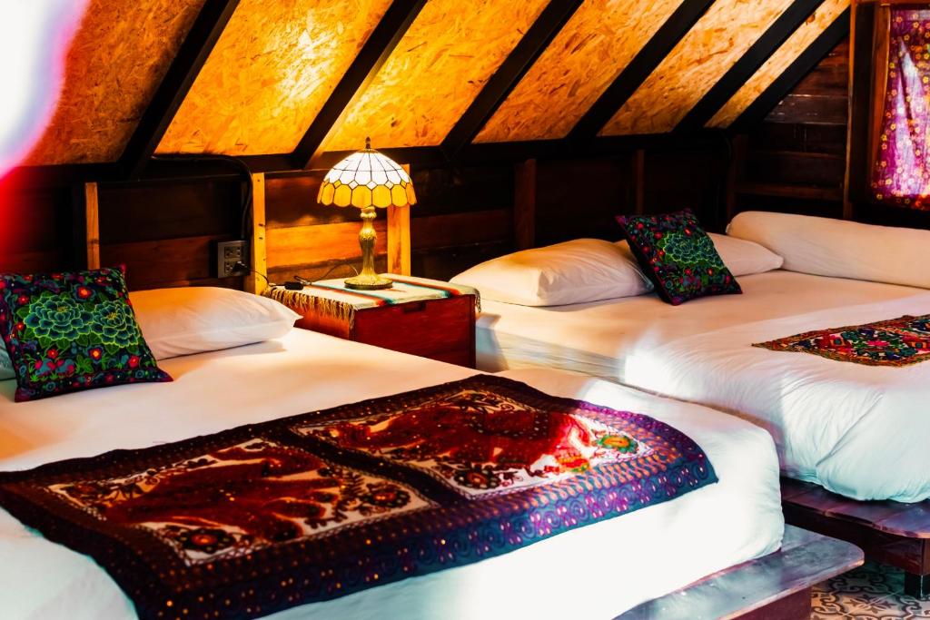 Postel nebo postele na pokoji v ubytování Coco Camping Koh Kood