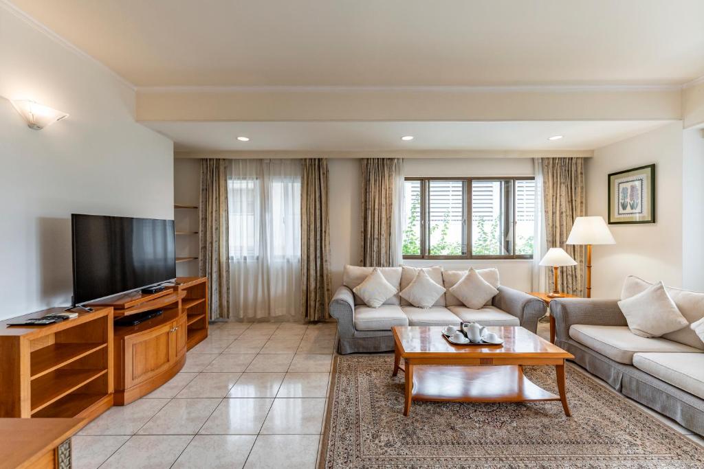 TV a/nebo společenská místnost v ubytování Garden View Court Suites Ho Chi Minh City