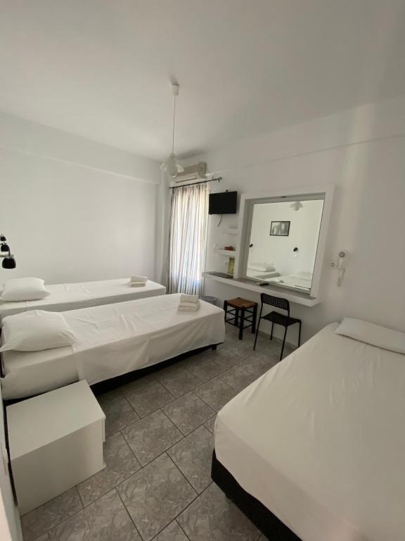Postel nebo postele na pokoji v ubytování Deep Blue Rooms & Apartments