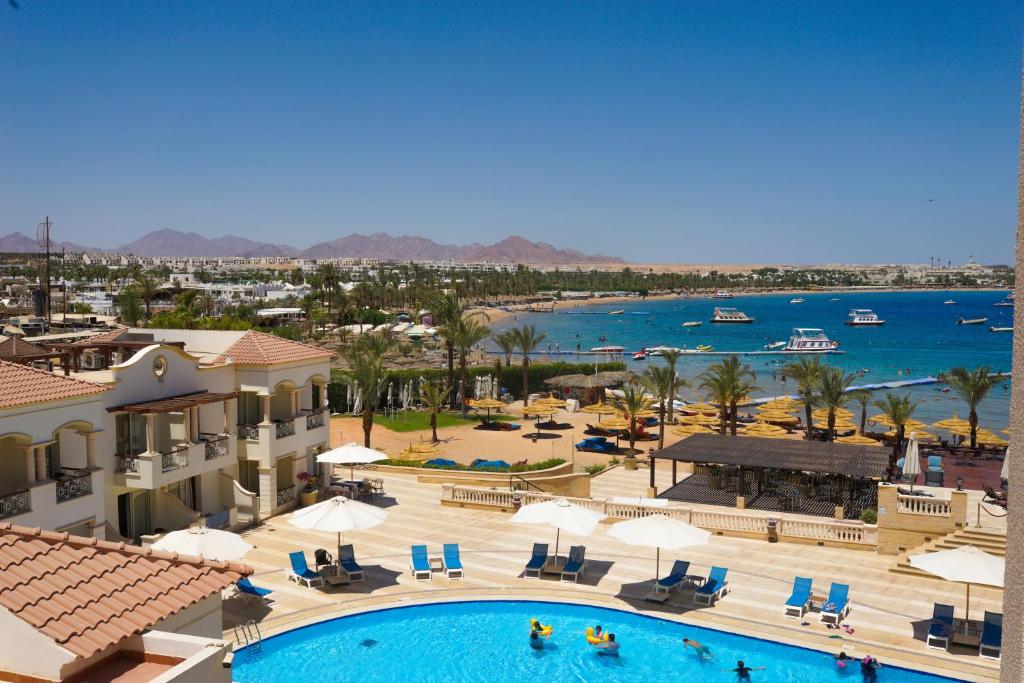 an aerial view of a resort with a swimming pool at Royal Club 24 Hours All Inclusive - Marina Sharm in Sharm El Sheikh