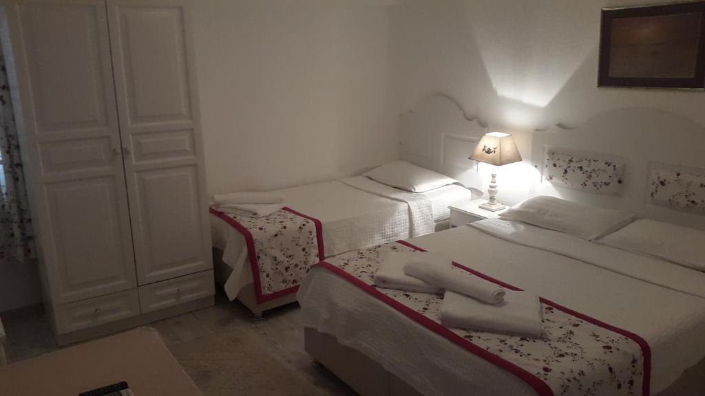 Postel nebo postele na pokoji v ubytování Pasha Motel