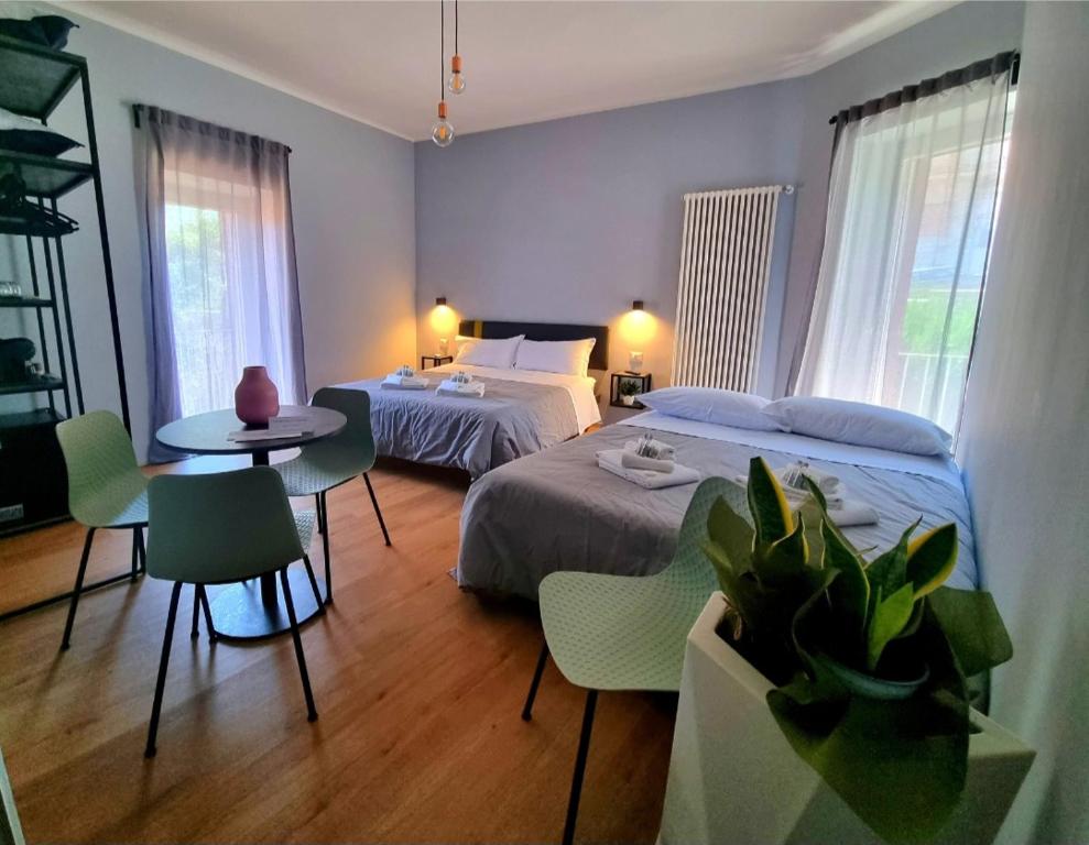 Postel nebo postele na pokoji v ubytování Residenza Gramsci