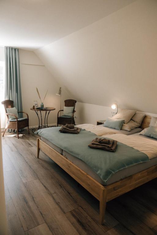 Postel nebo postele na pokoji v ubytování Primesurf House Fehmarn