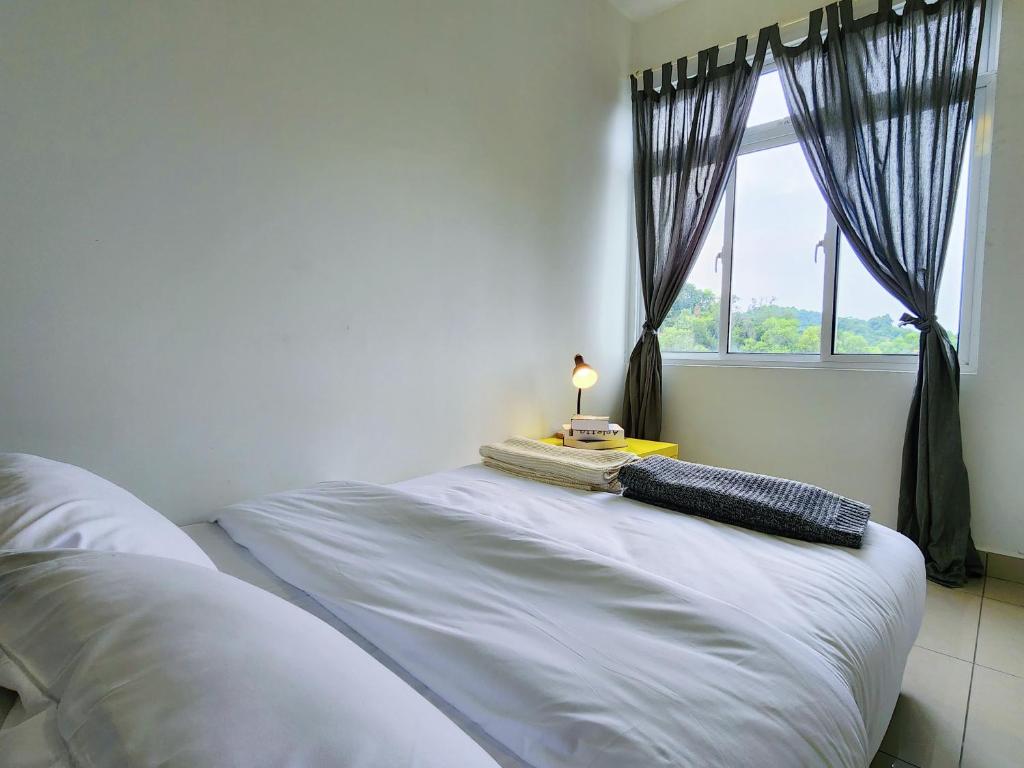 Postel nebo postele na pokoji v ubytování Dwiputra Residence Presint 15 PutraJAYA