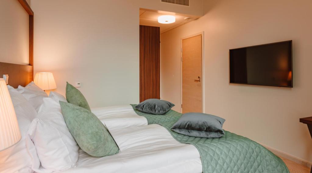 Postel nebo postele na pokoji v ubytování Clarion Hotel Helsinki
