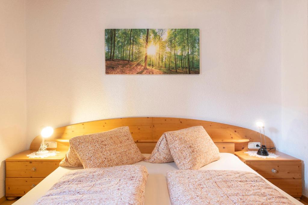Postel nebo postele na pokoji v ubytování Ferienwohnung am Gant