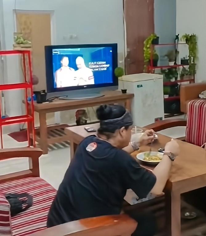 Rubikz Hostel & Cafeにあるテレビまたはエンターテインメントセンター