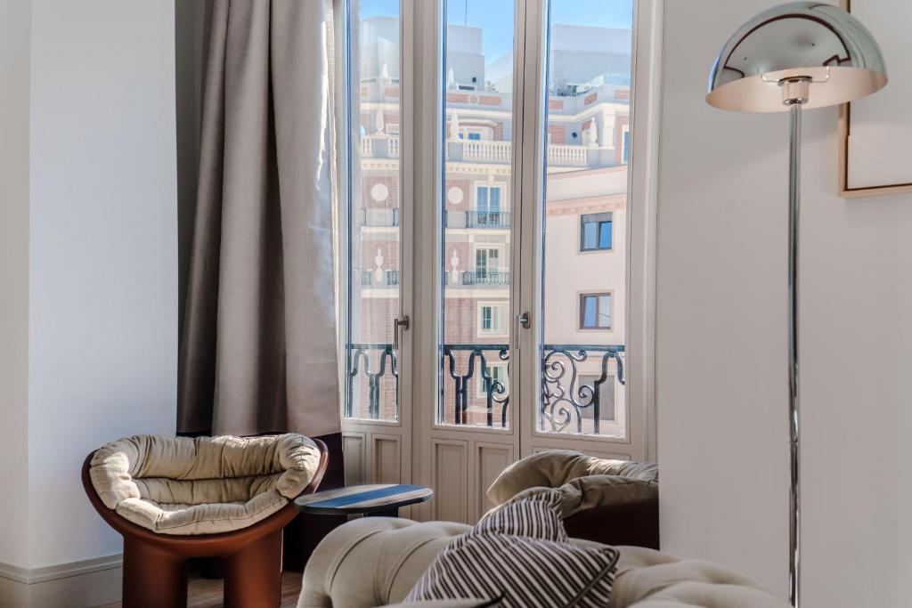 Posezení v ubytování Apartamentos Soho Boutique Hoy No Me Puedo Levantar