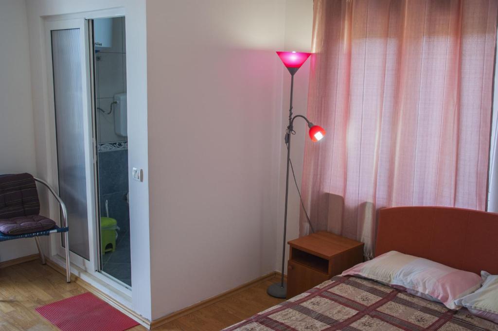 Krevet ili kreveti u jedinici u okviru objekta Axenia Hotel
