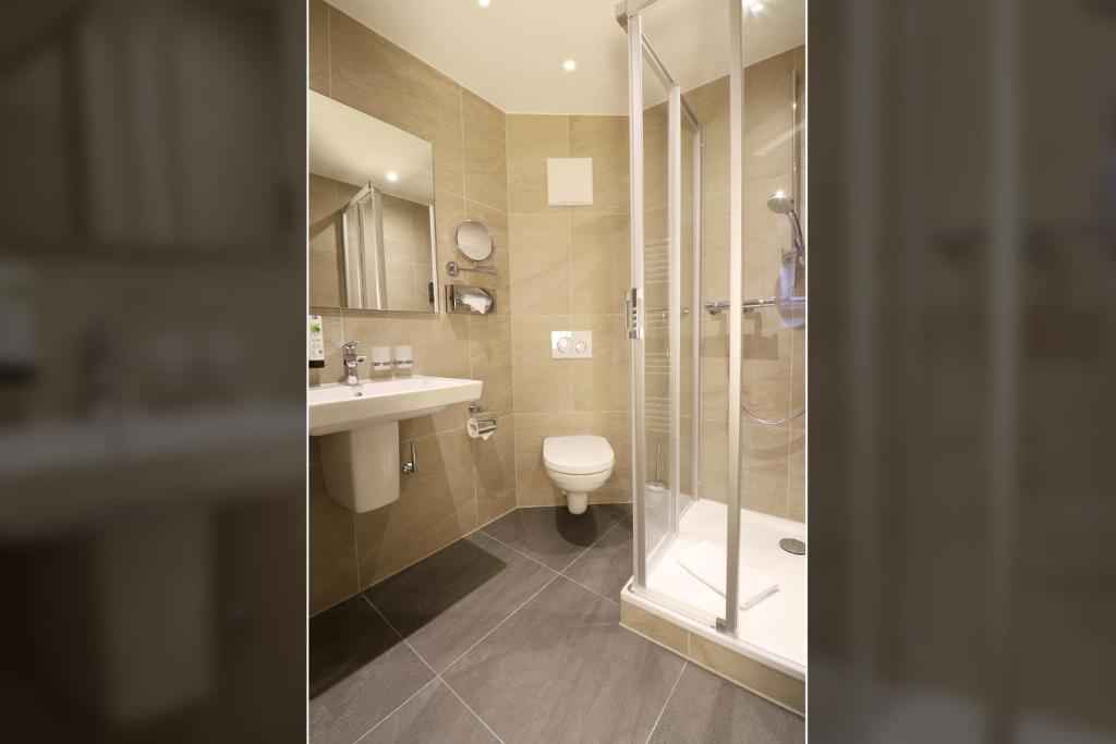 Koupelna v ubytování Hotel Goldene Rose