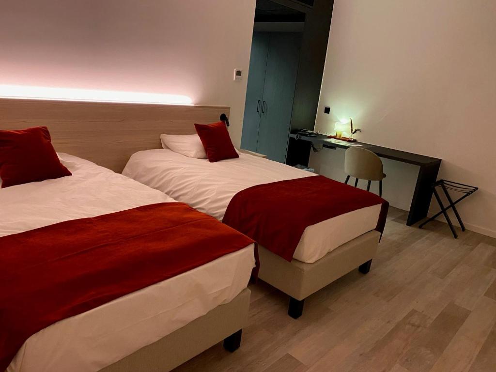Postel nebo postele na pokoji v ubytování Bremberg Hotel