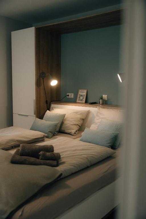 Postel nebo postele na pokoji v ubytování Primesurf House Fehmarn