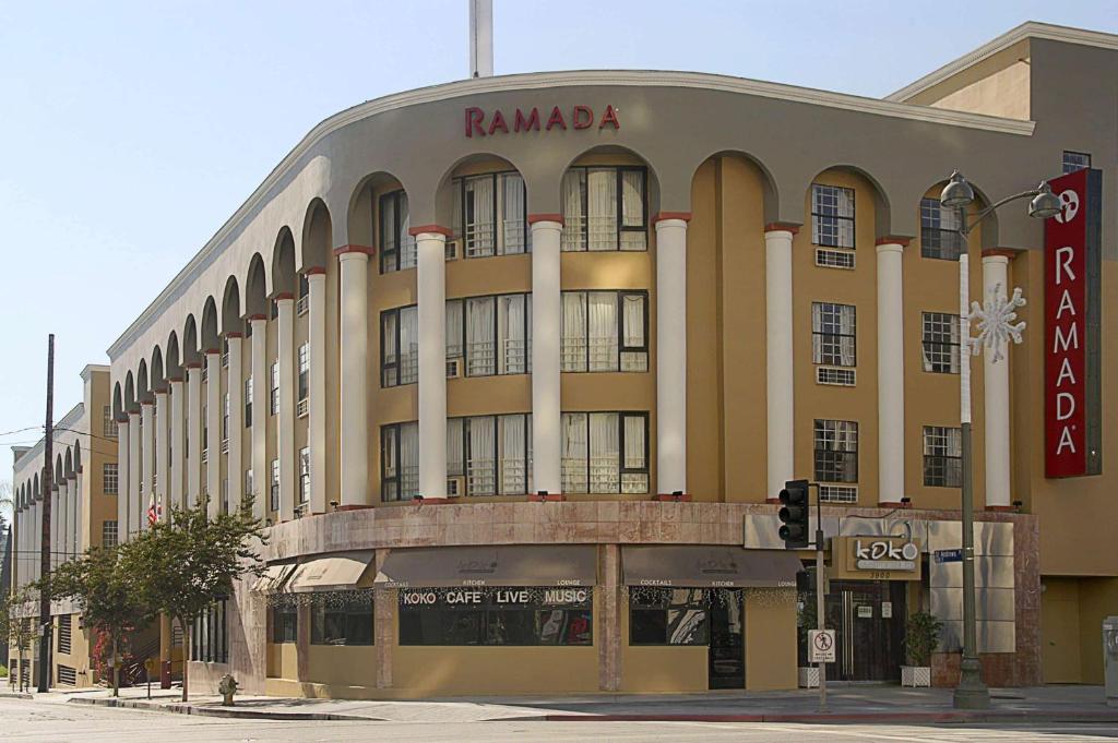 a large building on the corner of a street at Ramada by Wyndham Los Angeles/Wilshire Center in Los Angeles