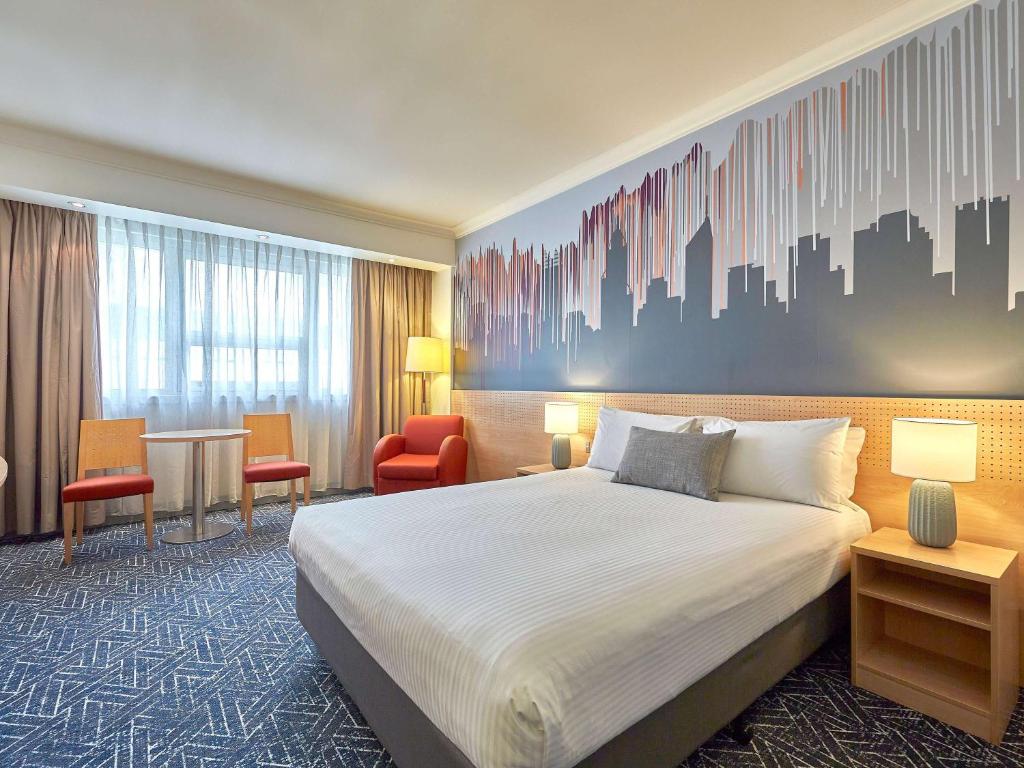 Postel nebo postele na pokoji v ubytování Mercure Perth