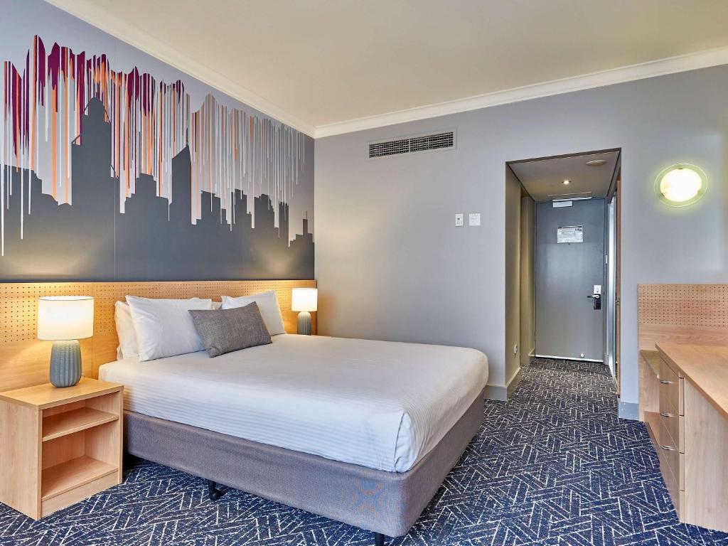 Postel nebo postele na pokoji v ubytování Mercure Perth